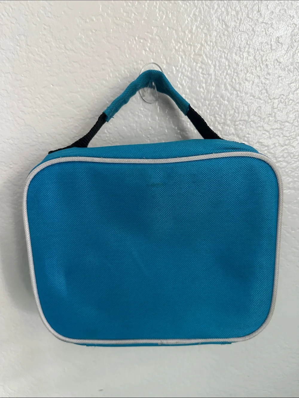 Walmart blue insulated lunch box with a minimalist white ’LUNCH’ graphic-used